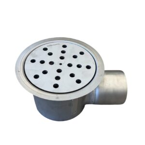 Rostfri golvbrunn sidoutlopp 110mm i rostfritt stål med ett runt, perforerat lock och ett utloppsrör på sidan, isolerad mot en vit bakgrund.