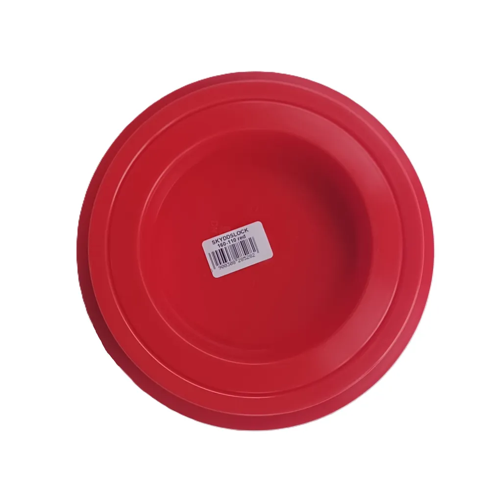 En rund, röd plasttallrik som liknar en Skyddslock 160–110 mm, med en vit streckkodsetikett i mitten, fotograferad mot en vit bakgrund.